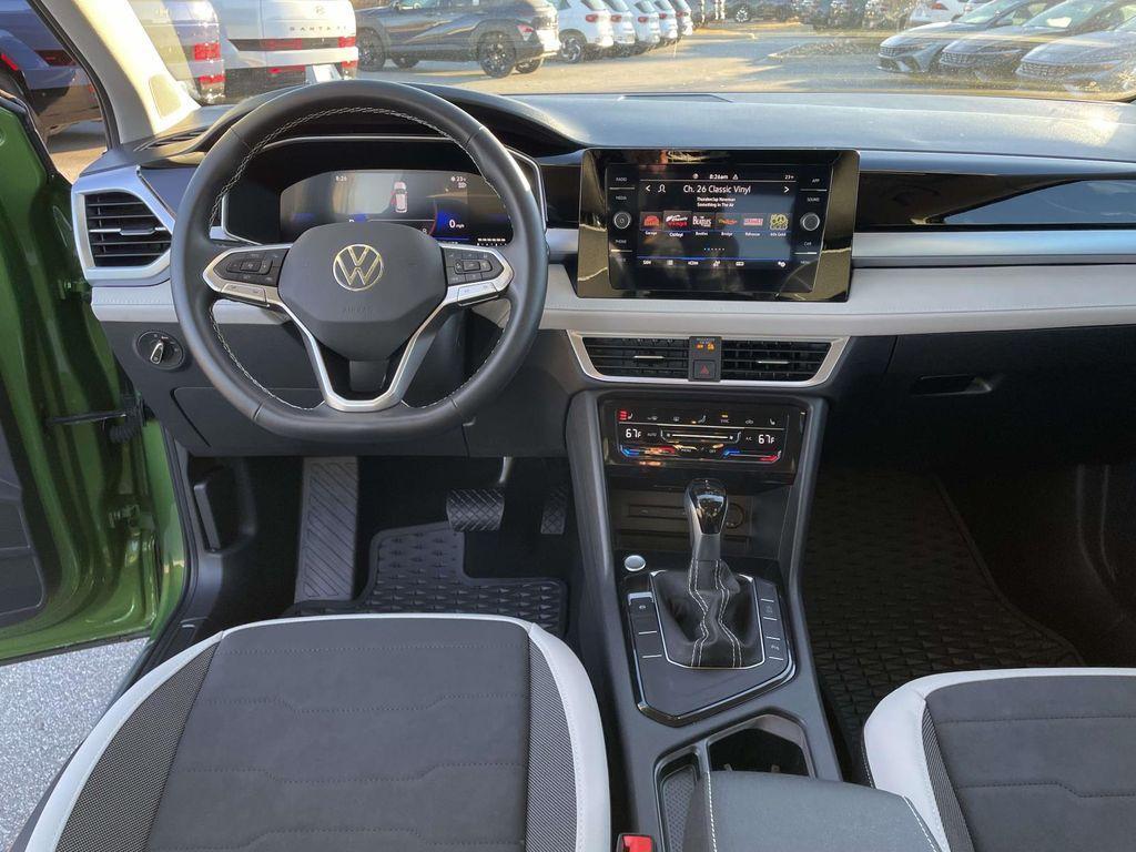used 2025 Volkswagen Taos car, priced at $22,908