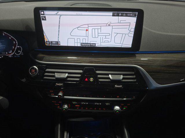 used 2023 BMW 530e car, priced at $27,592