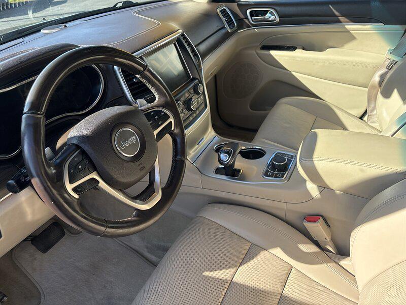 used 2014 Jeep Grand Cherokee car, priced at $9,488