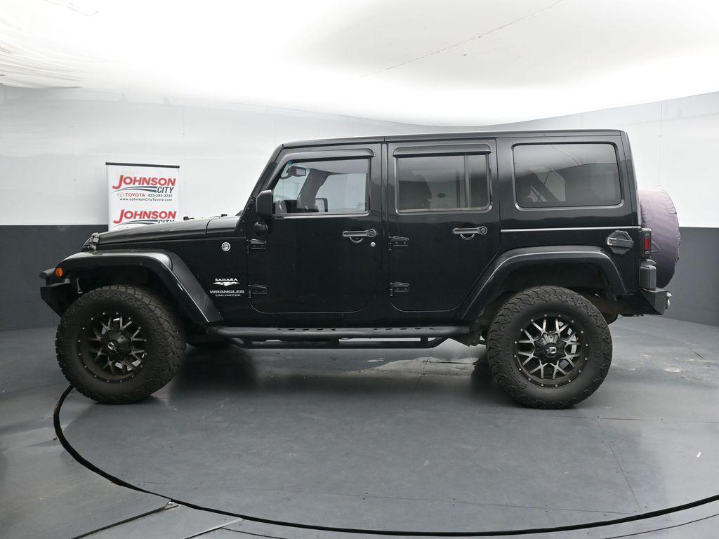 used 2013 Jeep Wrangler Unlimited car, priced at $14,683
