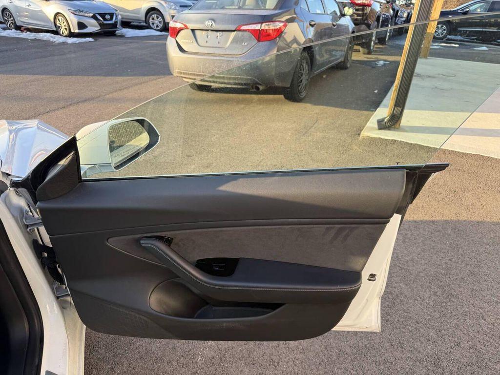 used 2018 Tesla Model 3 car, priced at $13,995