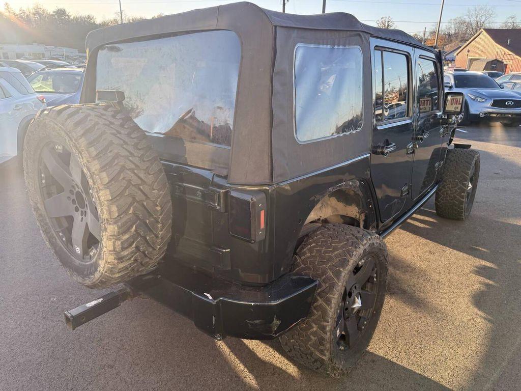 used 2011 Jeep Wrangler Unlimited car, priced at $10,995