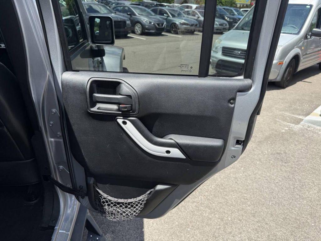 used 2014 Jeep Wrangler Unlimited car, priced at $14,433