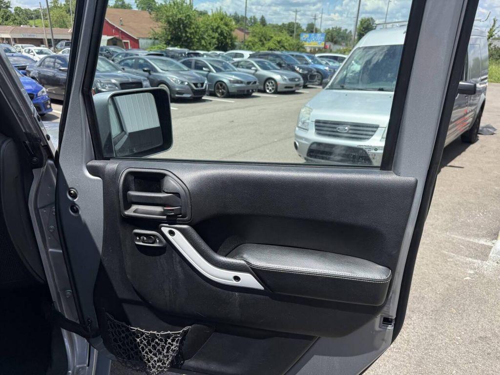 used 2014 Jeep Wrangler Unlimited car, priced at $14,433