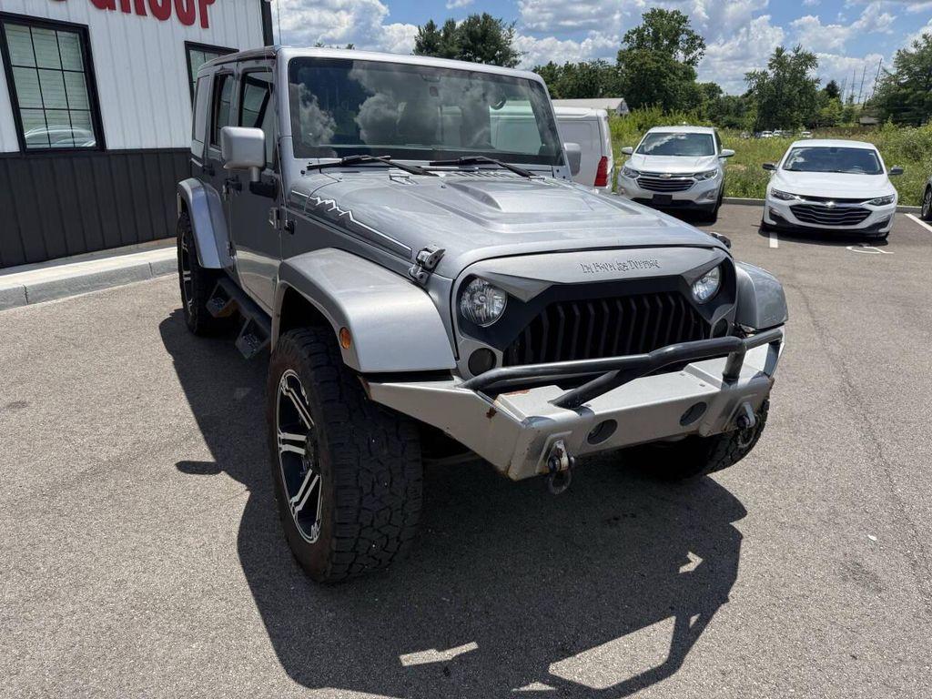 used 2014 Jeep Wrangler Unlimited car, priced at $14,433