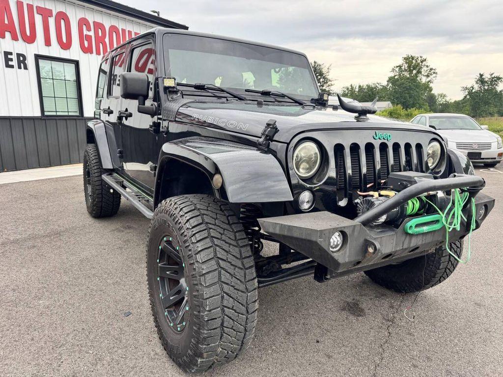 used 2014 Jeep Wrangler Unlimited car, priced at $18,433