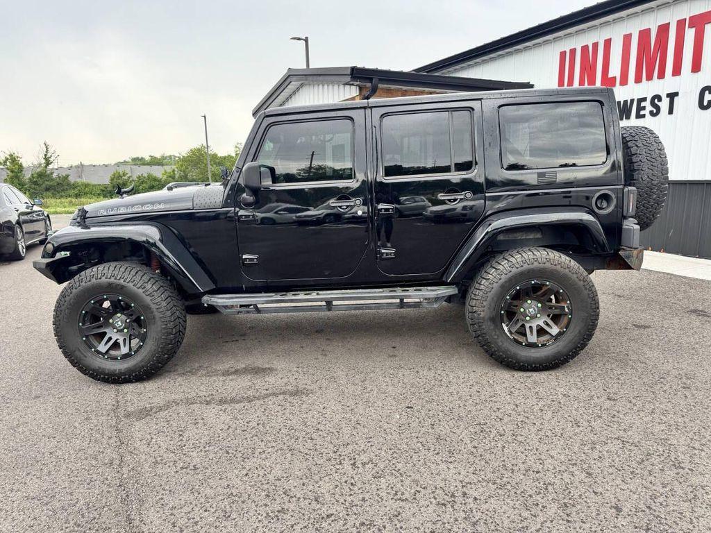 used 2014 Jeep Wrangler Unlimited car, priced at $18,433