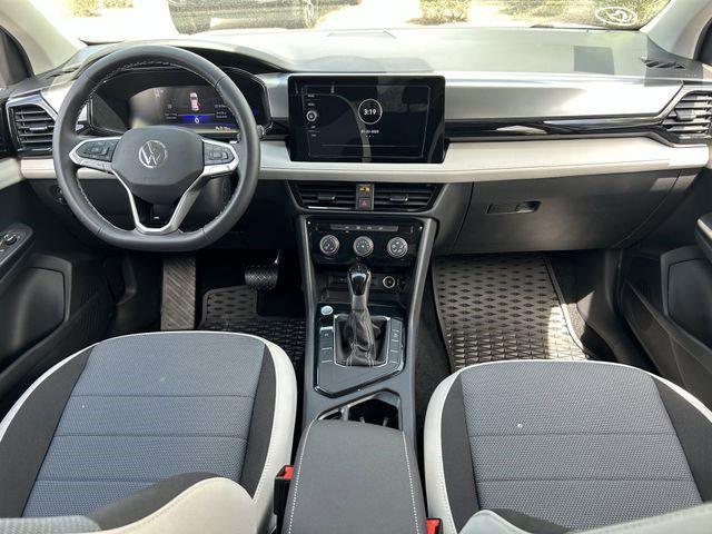 used 2025 Volkswagen Taos car, priced at $24,442
