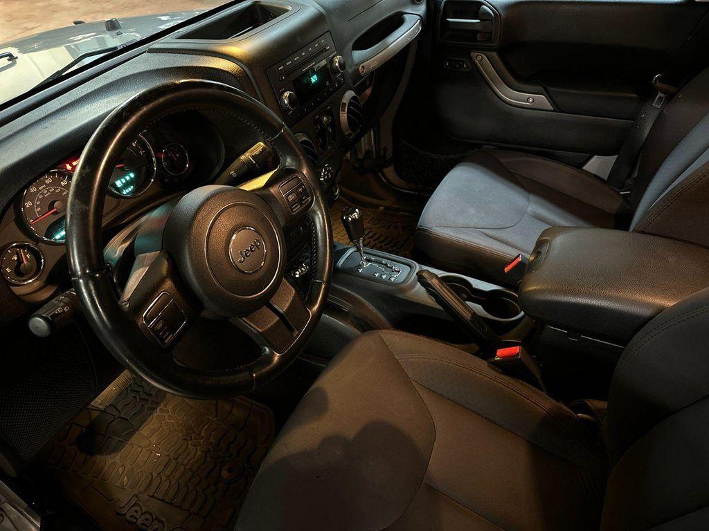 used 2015 Jeep Wrangler Unlimited car, priced at $13,888