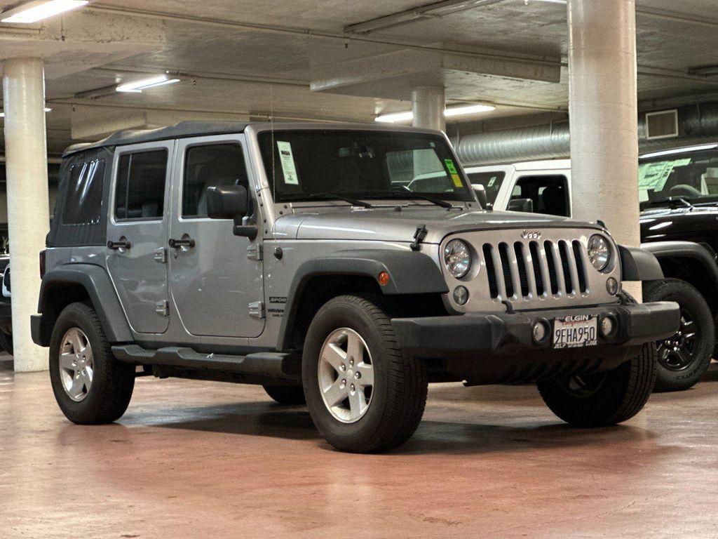 used 2015 Jeep Wrangler Unlimited car, priced at $13,888