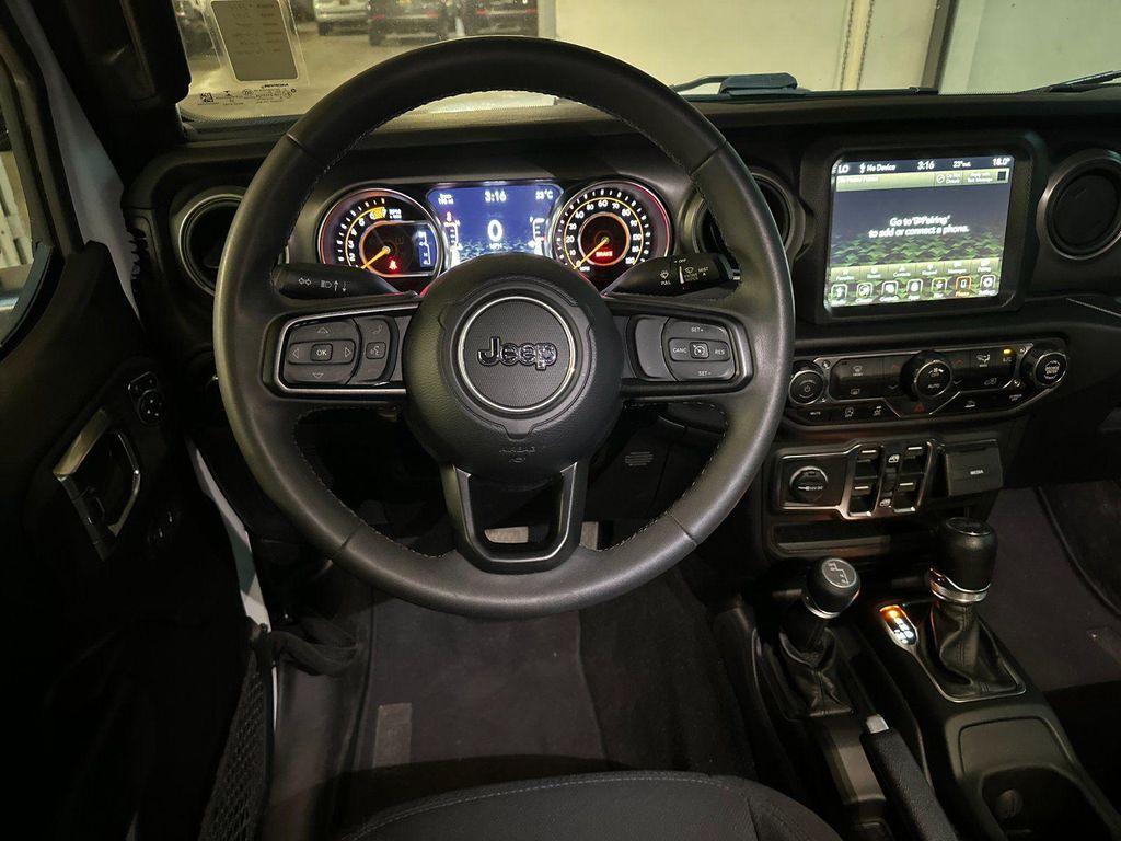 used 2023 Jeep Wrangler car, priced at $29,973
