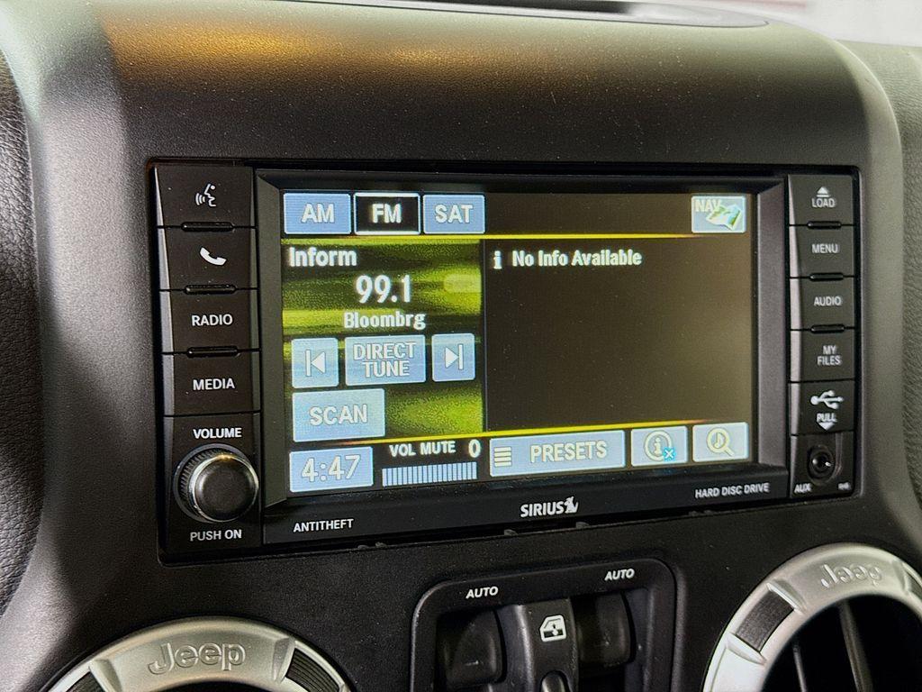 used 2015 Jeep Wrangler Unlimited car, priced at $18,798