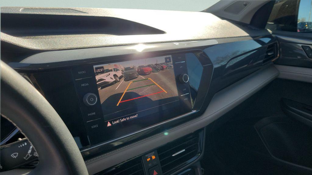 used 2022 Volkswagen Taos car, priced at $16,666