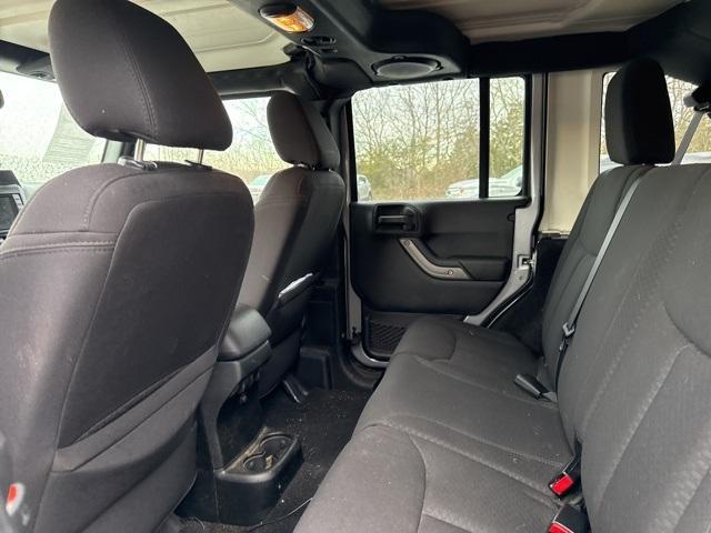 used 2013 Jeep Wrangler Unlimited car, priced at $13,965