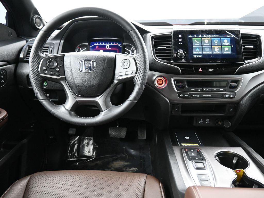 used 2024 Honda Passport car, priced at $33,500