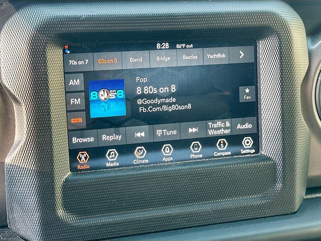 used 2023 Jeep Wrangler car, priced at $24,551