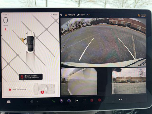 used 2023 Tesla Model 3 car, priced at $26,691