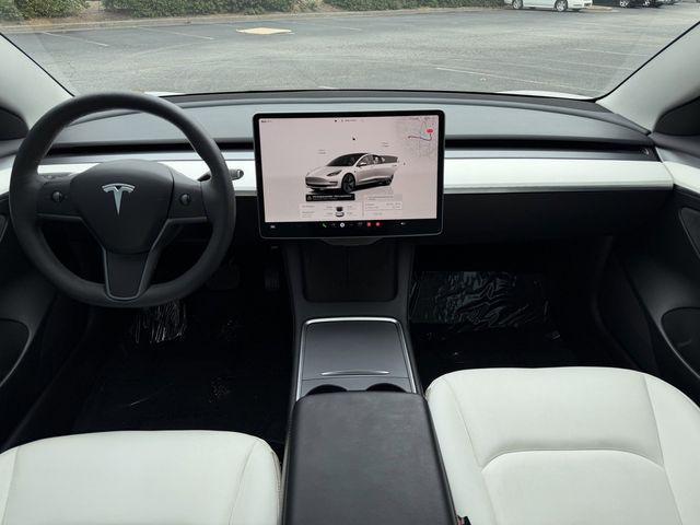 used 2023 Tesla Model 3 car, priced at $26,691