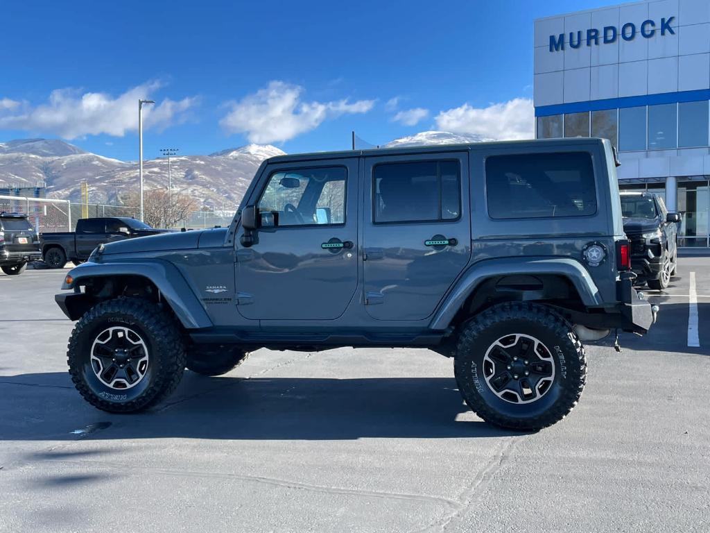 used 2015 Jeep Wrangler Unlimited car, priced at $14,990