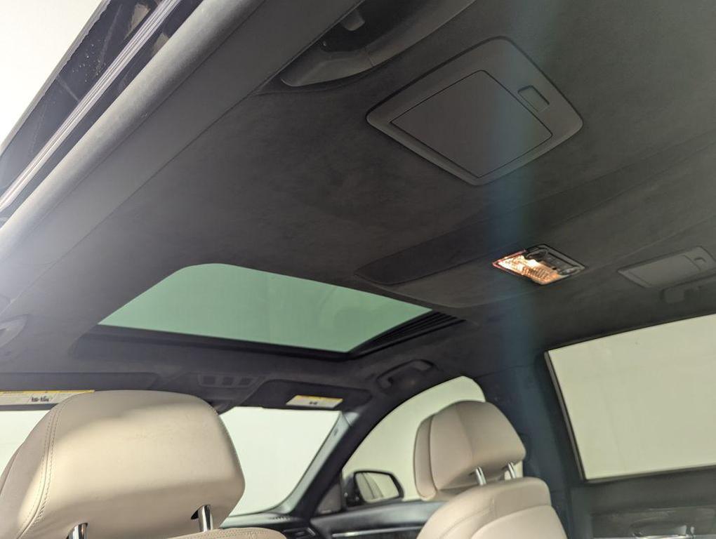 used 2015 BMW 750 car, priced at $20,000