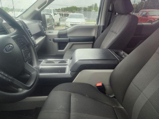used 2018 Ford F-150 car, priced at $23,192