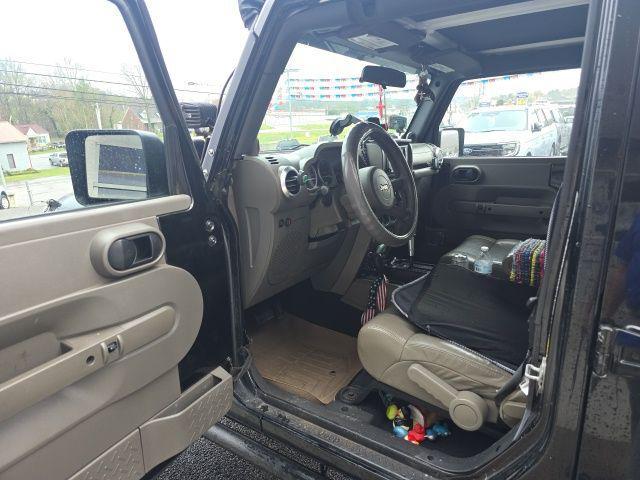 used 2010 Jeep Wrangler Unlimited car, priced at $12,529