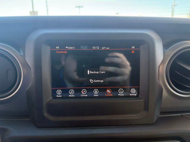 used 2023 Jeep Wrangler car, priced at $24,369