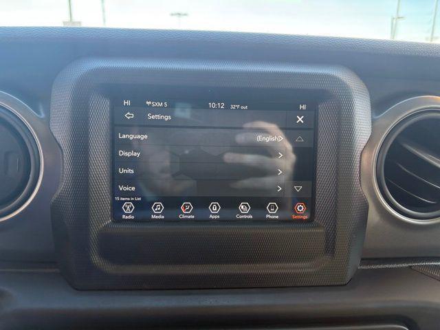 used 2023 Jeep Wrangler car, priced at $24,369