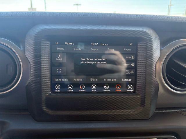 used 2023 Jeep Wrangler car, priced at $24,369