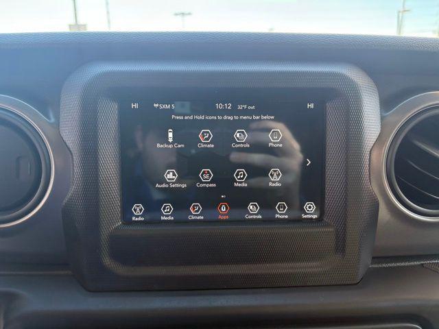 used 2023 Jeep Wrangler car, priced at $24,369