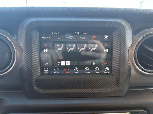 used 2023 Jeep Wrangler car, priced at $24,369