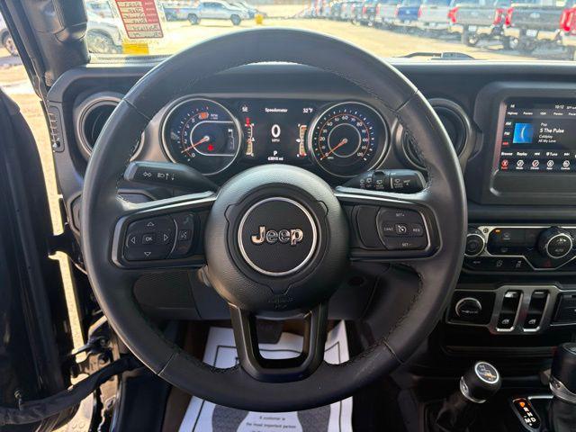 used 2023 Jeep Wrangler car, priced at $24,369