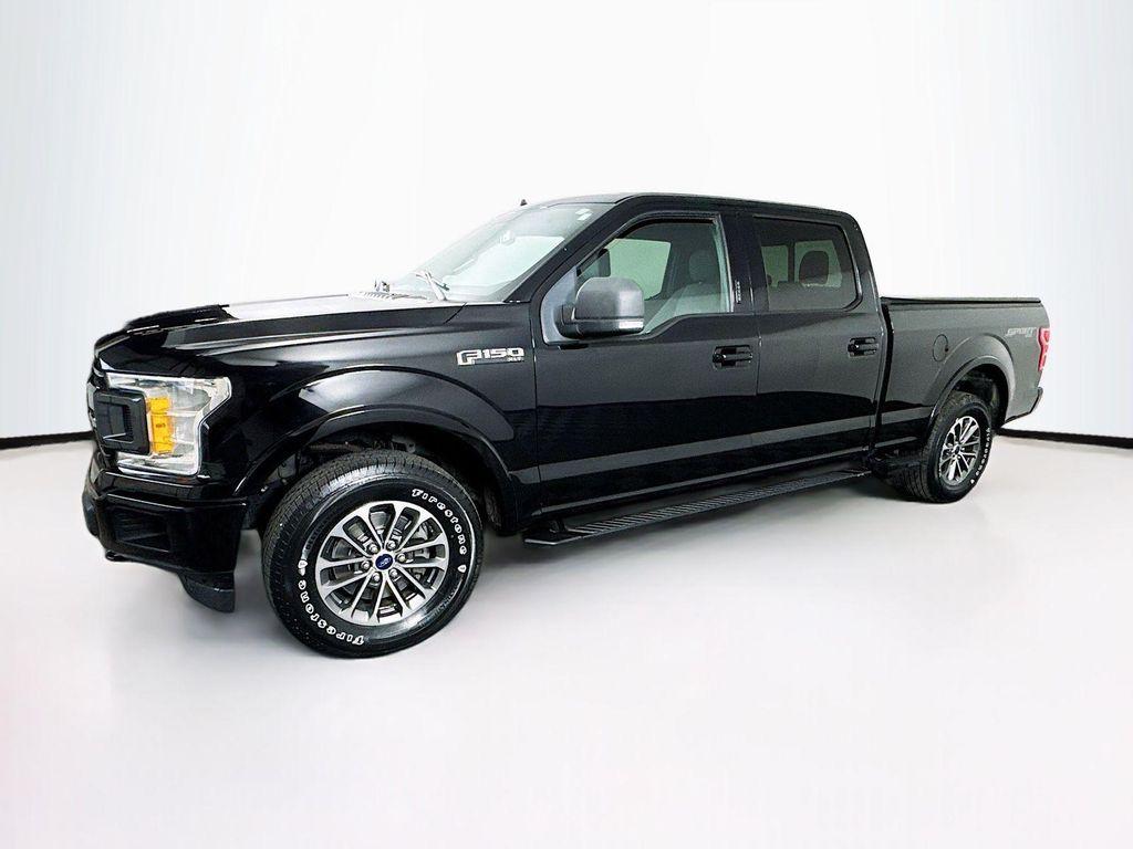 used 2018 Ford F-150 car, priced at $23,242