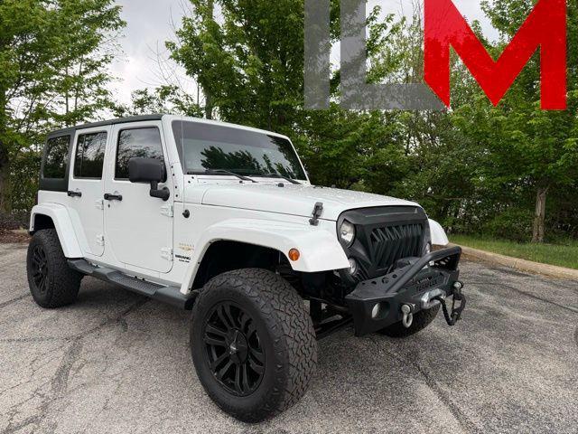 used 2014 Jeep Wrangler Unlimited car, priced at $16,976