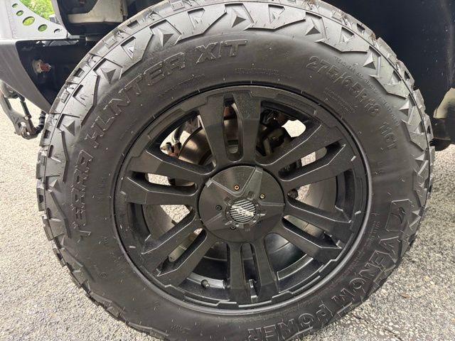 used 2014 Jeep Wrangler Unlimited car, priced at $16,976