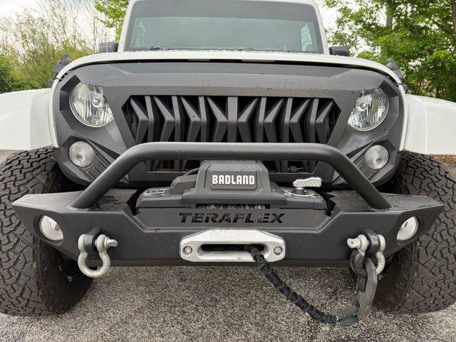 used 2014 Jeep Wrangler Unlimited car, priced at $16,976
