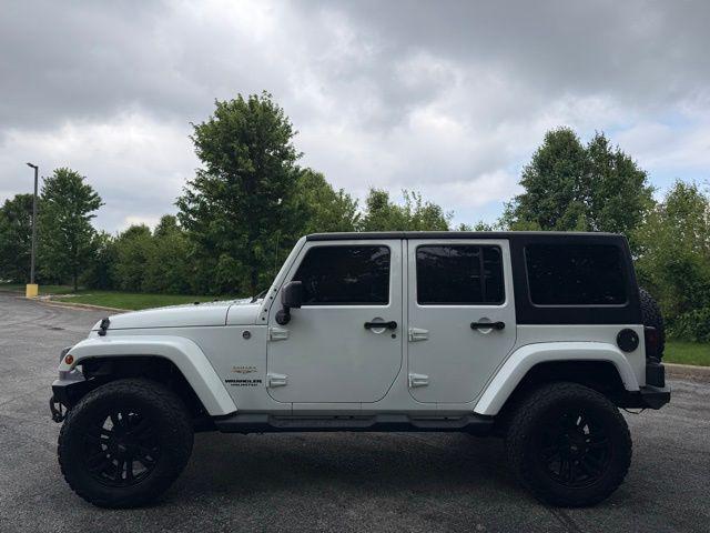 used 2014 Jeep Wrangler Unlimited car, priced at $16,976