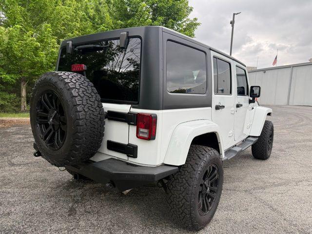 used 2014 Jeep Wrangler Unlimited car, priced at $16,976