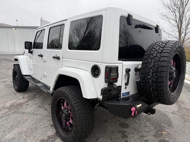 used 2015 Jeep Wrangler Unlimited car, priced at $13,976