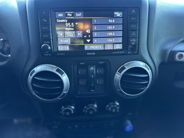 used 2015 Jeep Wrangler Unlimited car, priced at $13,976