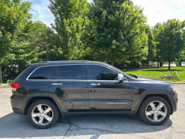 used 2014 Jeep Grand Cherokee car, priced at $10,976