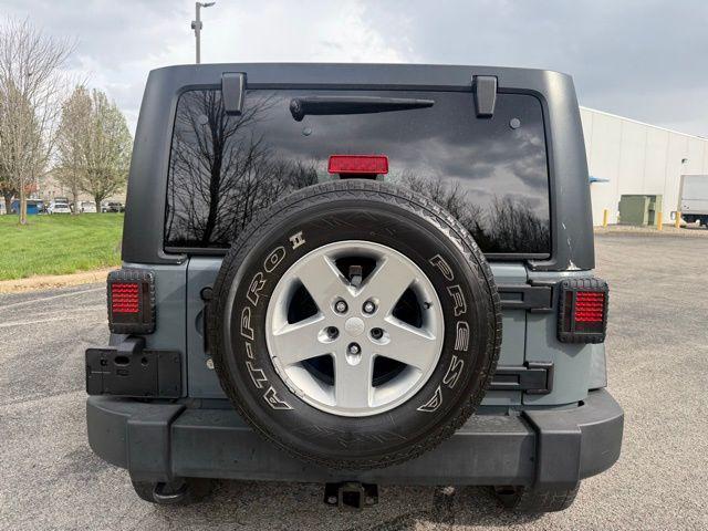 used 2014 Jeep Wrangler Unlimited car, priced at $13,976