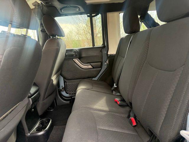 used 2014 Jeep Wrangler Unlimited car, priced at $13,976