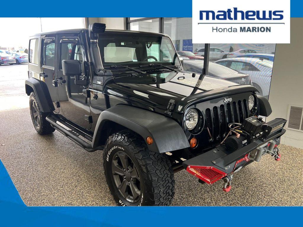 used 2013 Jeep Wrangler Unlimited car, priced at $16,750
