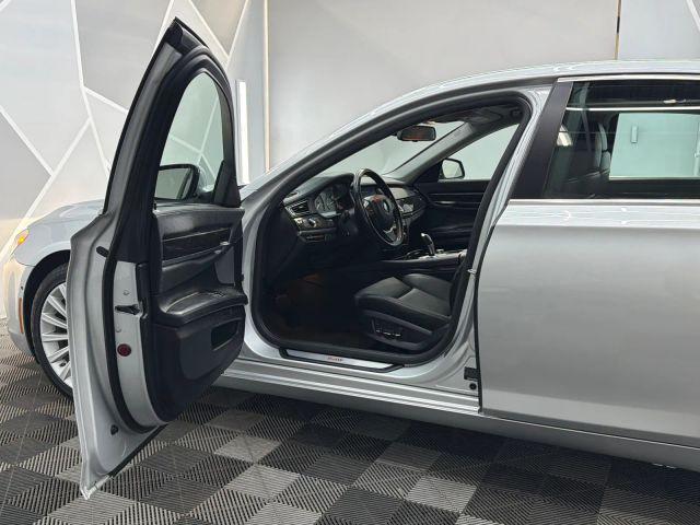 used 2012 BMW 750 car, priced at $10,200