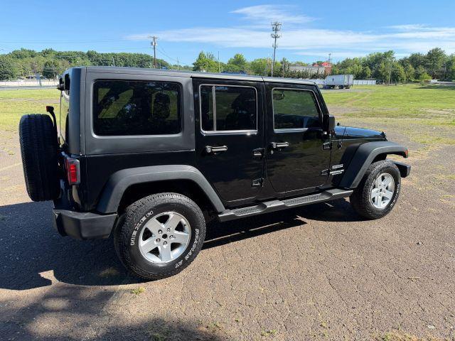 used 2015 Jeep Wrangler Unlimited car, priced at $13,300