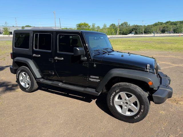 used 2015 Jeep Wrangler Unlimited car, priced at $13,300