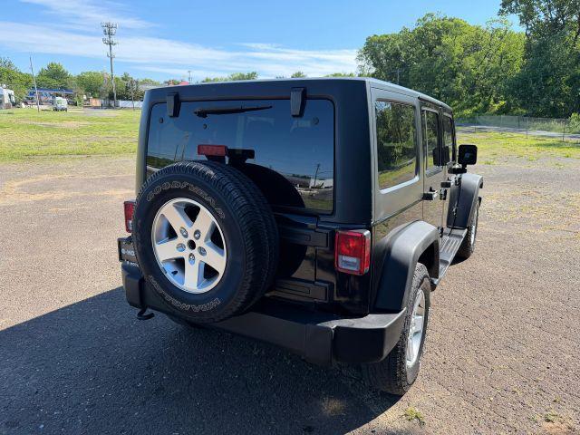 used 2015 Jeep Wrangler Unlimited car, priced at $13,300