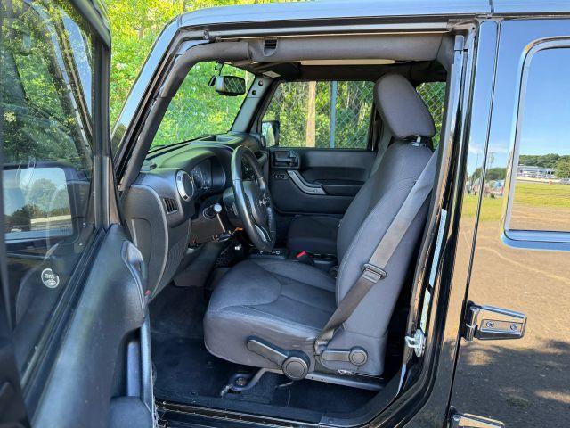 used 2015 Jeep Wrangler Unlimited car, priced at $13,300