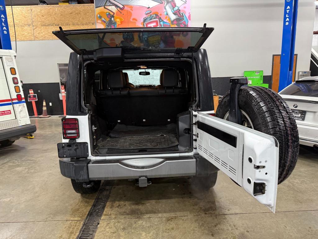 used 2014 Jeep Wrangler Unlimited car, priced at $13,990